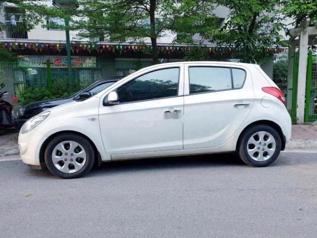 Cần bán lại xe Hyundai i20 1.4L AT năm sản xuất 2010, màu trắng, xe nhập số tự động