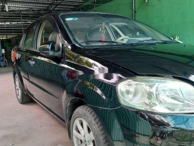 Cần bán Daewoo Gentra đời 2009, màu đen xe gia đình