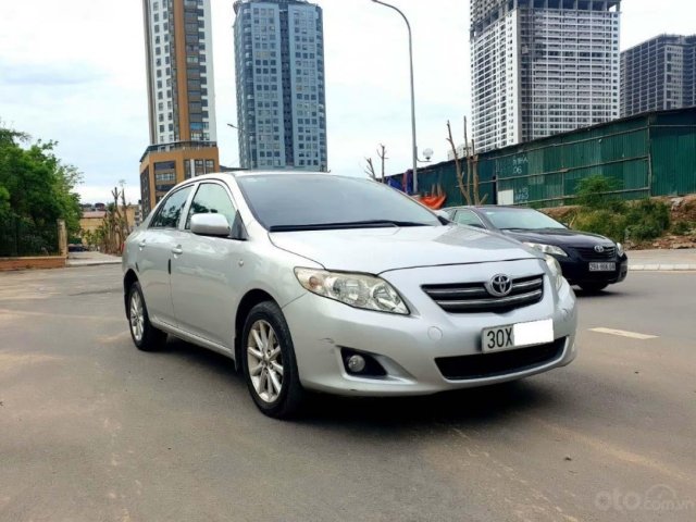 Bán xe Toyota Corolla XLi 1.6 năm 2010, màu bạc, xe nhập  