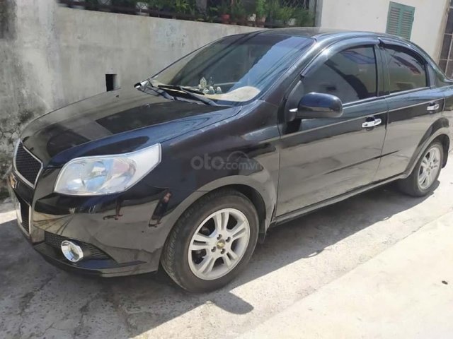 Bán Chevrolet Aveo LT 1.4 MT đời 2017, màu đen còn mới 