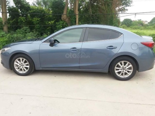 Cần bán xe Mazda 3 1.5 AT đời 2016, màu xanh lam còn mới 