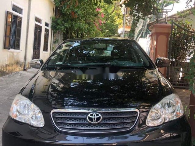 Cần bán Toyota Corolla Altis 2005, màu đen, xe gia đình0