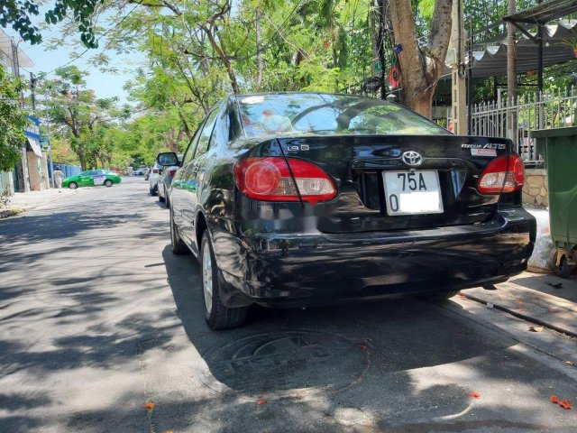 Gia đình bán xe Toyota Corolla Altis đời 2005, màu đen0