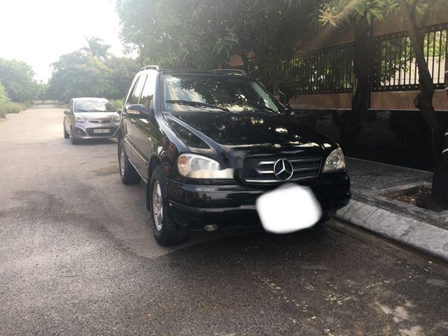 Thanh lý xe Mercedes ML320 đời 2002, màu đen, 140tr