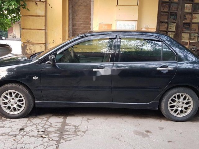 Cần bán lại xe Mitsubishi Lancer năm 2005 xe gia đình0