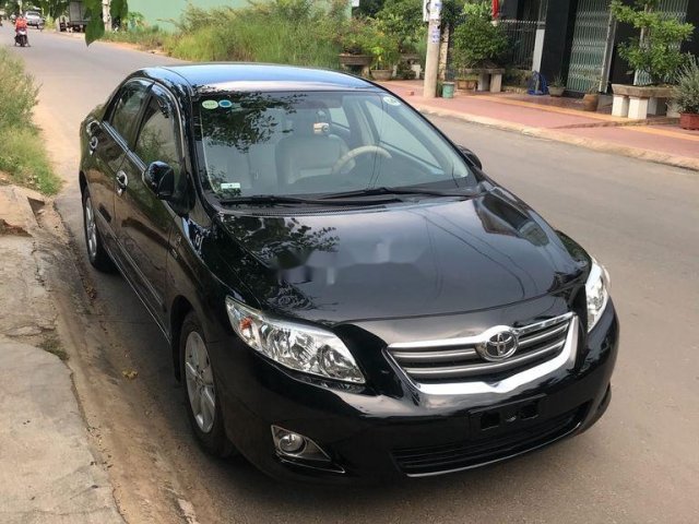 Bán Toyota Corolla Altis đời 2010, màu đen 0