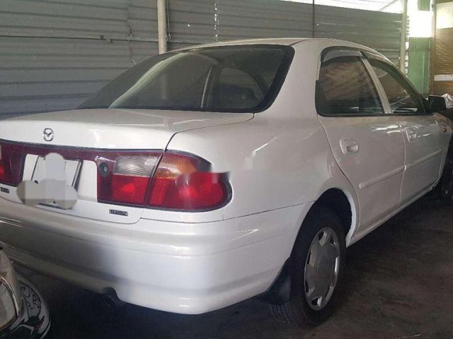 Bán Mazda 323 đời 2000, màu trắng, giá tốt0