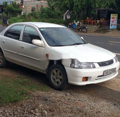 Bán Mazda 323 2000, màu trắng, xe nhập còn mới0