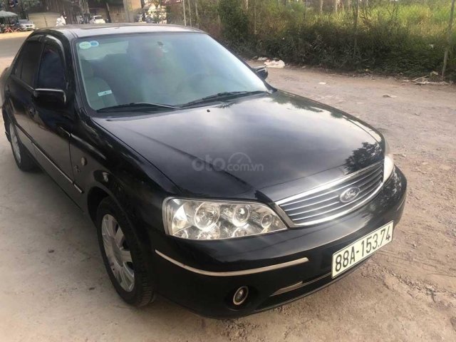 Bán Ford Laser 1.8AT sản xuất năm 2004, màu đen, nhập khẩu nguyên chiếc, giá tốt