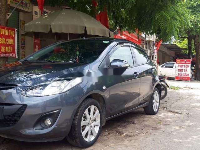 Cần bán gấp Mazda 2 AT đời 2012, màu xanh0