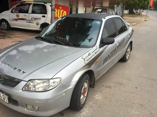 Bán ô tô Mazda 323 sản xuất 2004, màu bạc, giá cạnh tranh0