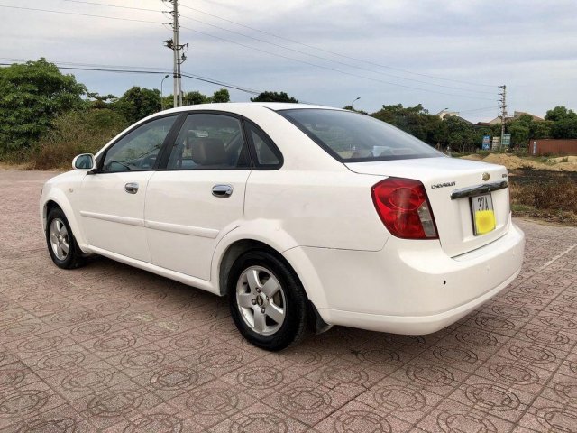 Cần bán gấp Daewoo Lacetti đời 2004, màu trắng còn mới 0