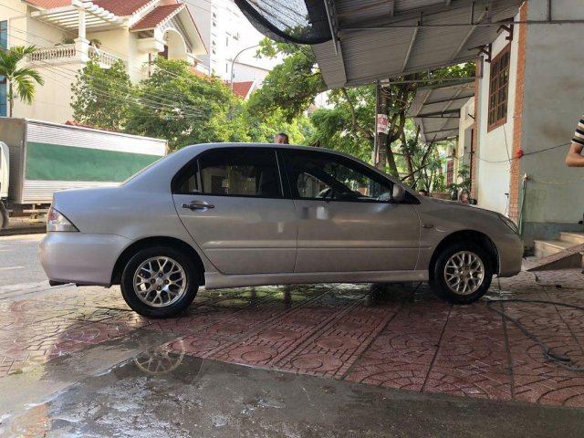 Bán ô tô Mitsubishi Lancer 2005, màu bạc  0