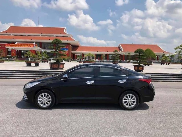 Bán Hyundai Accent 1.4 AT đời 2018, màu đen còn mới 0