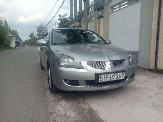 Cần bán xe Mitsubishi Lancer 1.6 AT sản xuất 2004, màu xám  0