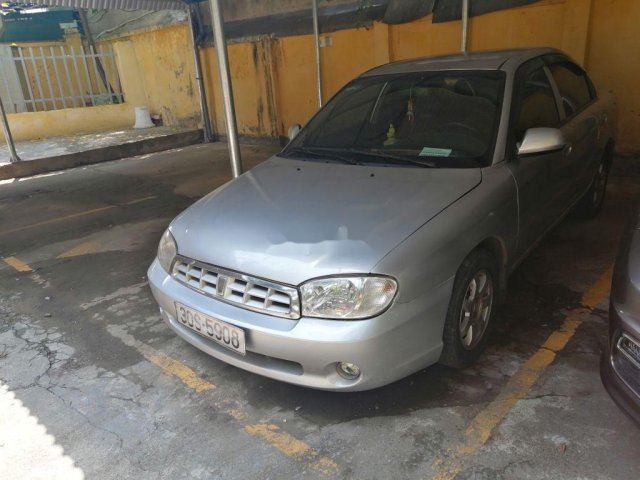 Cần bán Kia Spectra năm sản xuất 2004, màu bạc còn mới