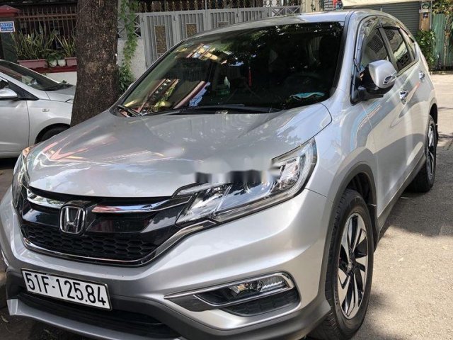 Cần bán xe Honda CR V năm 2015, màu bạc còn mới, giá 725tr