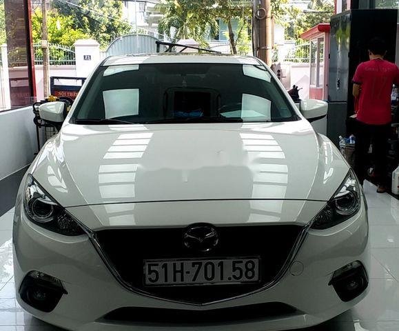 Cần bán lại xe Mazda 3 2016, màu trắng, nhập khẩu  0