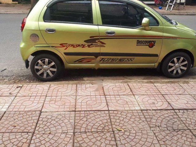 Bán Chevrolet Spark đời 2011, màu vàng chanh, giá 92tr