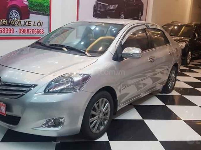 Cần bán lại xe Toyota Vios 1.5E đời 2013, màu bạc 0