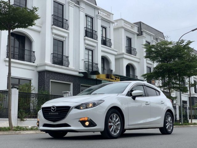 Cần bán xe Mazda 3 sản xuất năm 2015, màu trắng  0