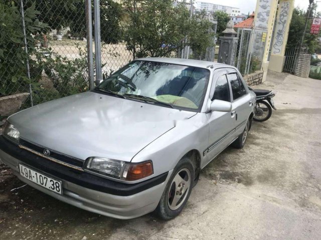 Cần bán gấp Mazda 323 năm 1995, màu bạc, nhập khẩu, 65tr