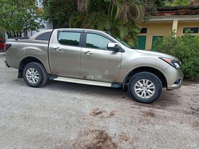 Cần bán xe Mazda BT 50 sản xuất năm 2015, màu ghi vàng 0