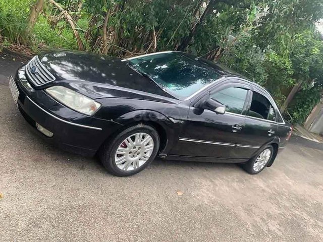 Bán xe Ford Mondeo sản xuất 2004, màu đen, số tự động0