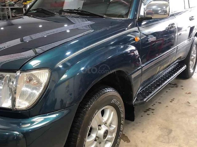 Bán ô tô Toyota Land Cruiser đời 2004, màu xanh lam0