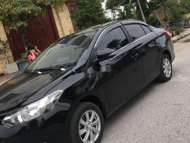 Bán Toyota Vios đời 2015, màu đen xe gia đình0