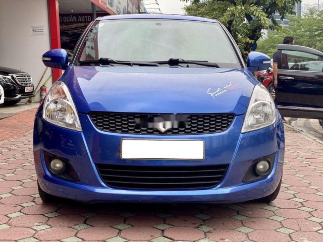 Bán xe Suzuki Swift đời 2015, màu xanh lam còn mới0