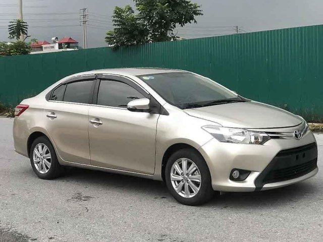 Bán xe Toyota Vios năm 2016, màu vàng số sàn0