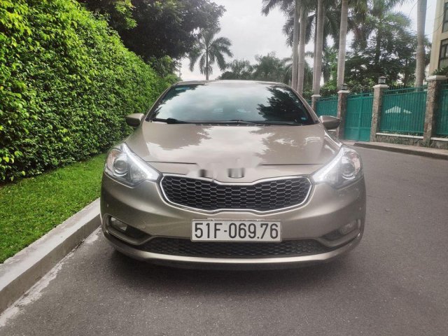 Cần bán lại xe Kia K3 1.6L đời 2014, màu nâu, xe nhập còn mới0