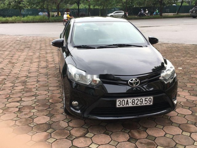 Cần bán lại xe Toyota Vios sản xuất 2015, màu đen còn mới  0