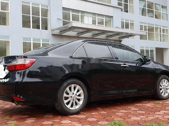 Cần bán xe Toyota Camry AT 2.0E năm sản xuất 2015, màu đen 0