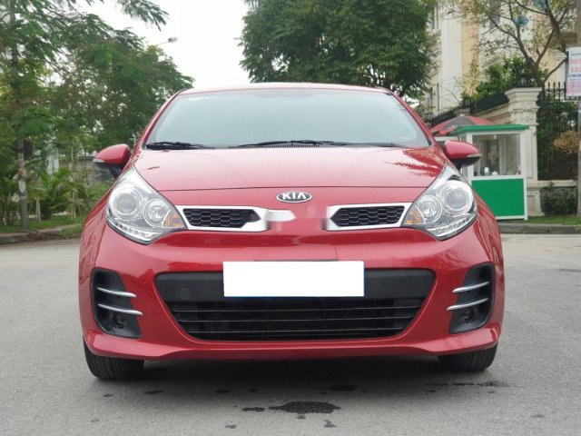 Cần bán lại xe Kia Rio sản xuất năm 2015, màu đỏ, số tự động0