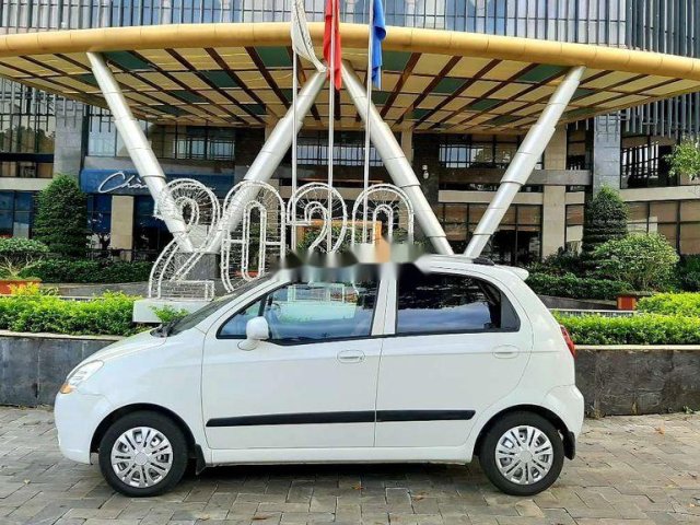 Cần bán xe Chevrolet Spark 2013, màu trắng, mới đăng ký 20180