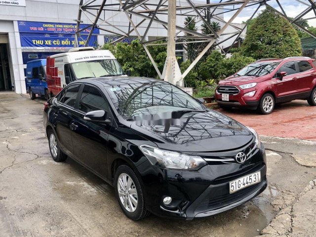 Bán xe Toyota Vios 1.5E AT đời 2017, màu đen số tự động