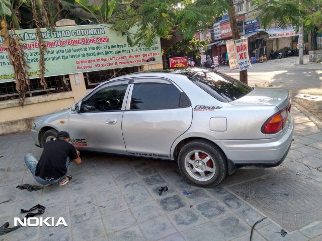 Bán Mazda 323 đời 1997, màu bạc, nhập khẩu còn mới0