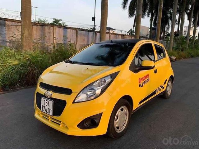 Cần bán xe Chevrolet Spark Ls năm 2015, màu vàng0