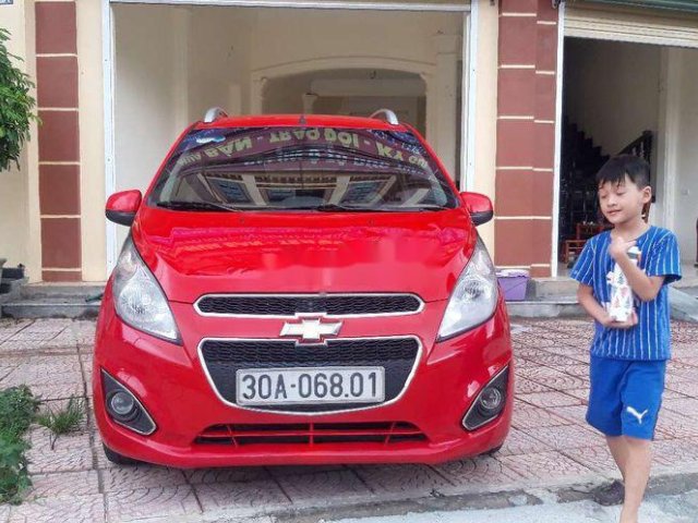 Bán Chevrolet Spark sản xuất năm 2013, màu đỏ còn mới 