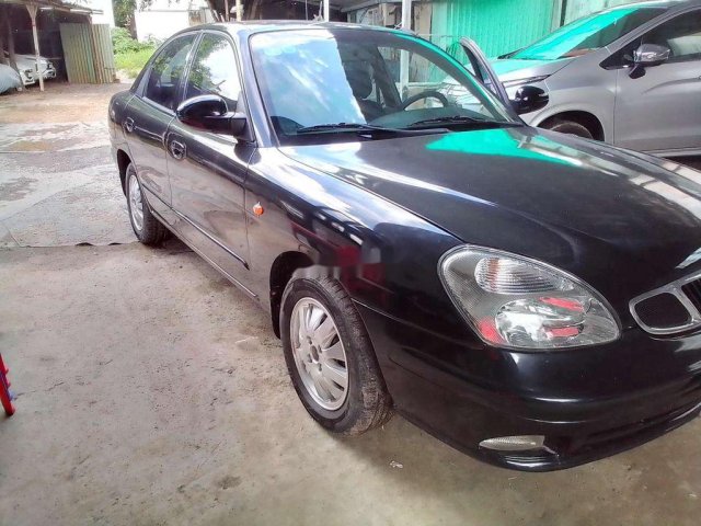 Cần bán xe Daewoo Nubira sản xuất 2002, màu đen còn mới, giá 69tr0