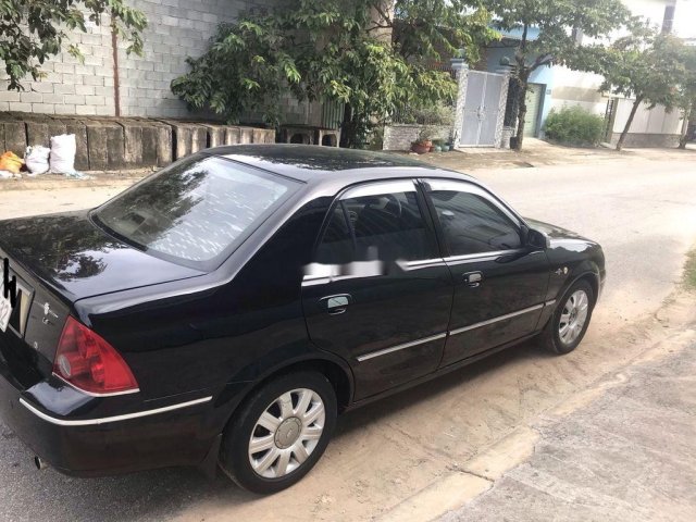 Cần bán Ford Laser đời 2005, màu đen còn mới, 185tr