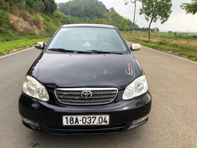 Cần bán lại xe Toyota Corolla Altis sản xuất 2002, màu đen  