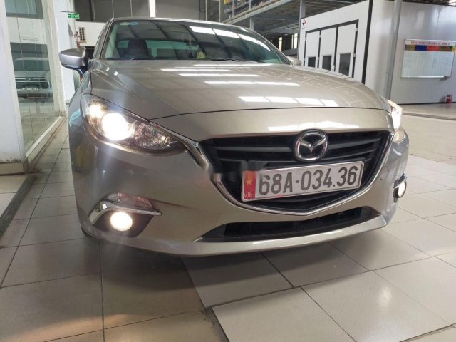 Cần bán gấp Mazda 3 1.5AT, màu vàng cát, sản xuất năm 2015