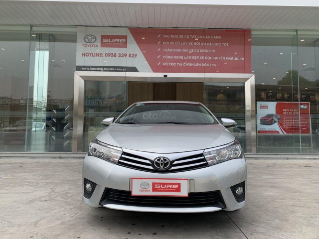 Cần bán xe Toyota Corolla Altis 1.8G CVT 2015 màu bạc đi 69.000km, BS. TpHCM - xe chất giá tốt chính hãng