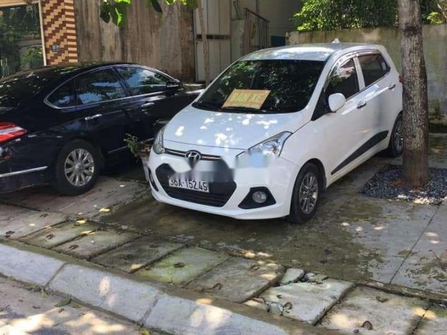 Cần bán gấp Hyundai Grand i10 đời 2015, màu trắng, nhập khẩu còn mới, giá chỉ 315 triệu0