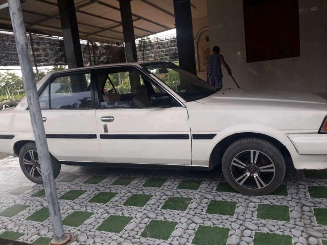 Bán Toyota Carina 1986, màu trắng, xe đi tập lái