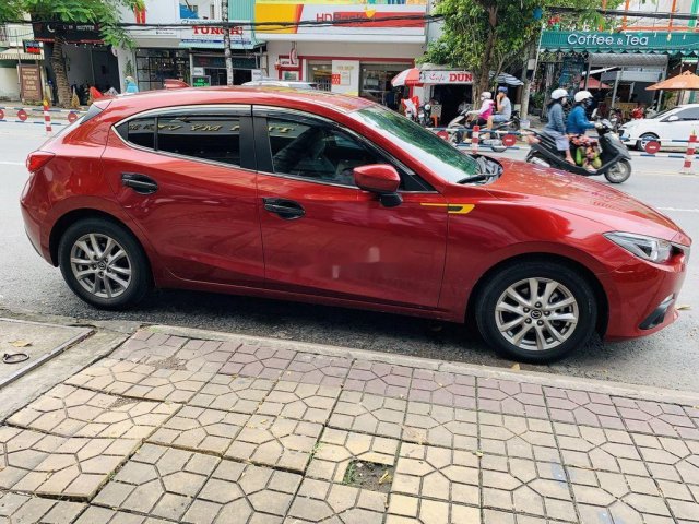 Bán xe Mazda 3 1.5AT đời 2016, màu đỏ 