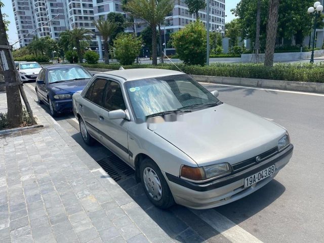 Cần bán lại xe Mazda 323 đời 1995, màu bạc, nhập khẩu